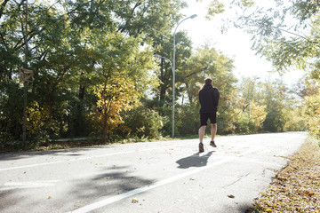 Runner running in park