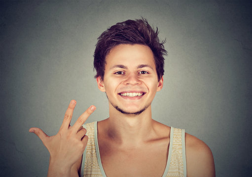 man giving a three fingers sign gesture with hand