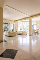 Bright living room with large sofa