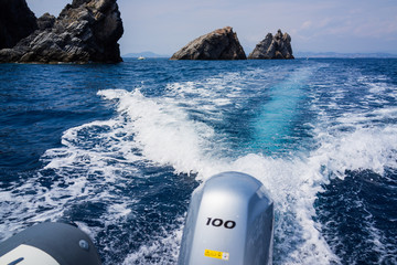Water trail behind moving motor boat
