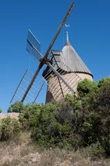 Fototapeten Historic windmill in France. Mill blades. © A
