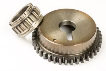 Metal gear wheel isolated over white background with copy space