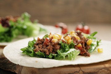 open tortilla with beef, frillice and corn, organic fastfood