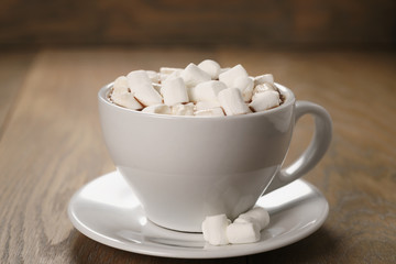 cup of homemade hot chocolate with marshmallows, shallow focus