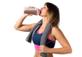 Athlete woman drinking a sport drink
