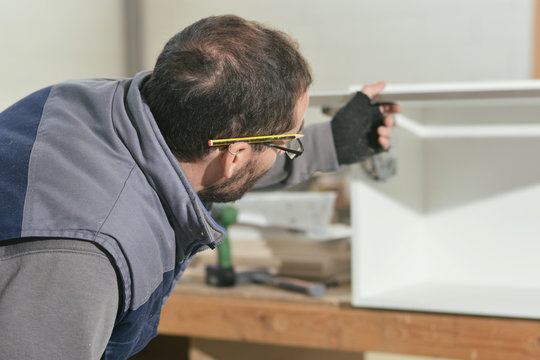 Carpenter working in his workshop