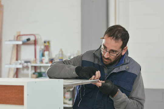 Carpenter working in his workshop