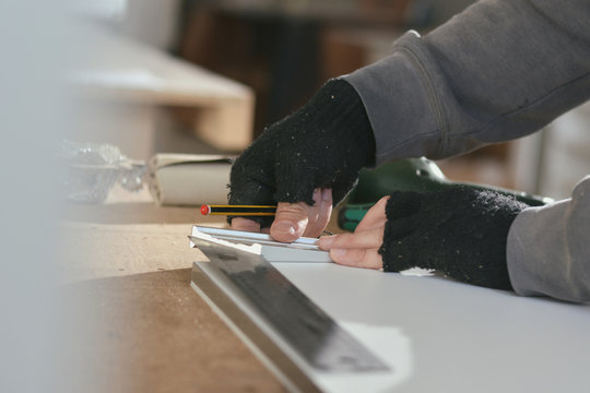 Carpenter working on a furniture piece