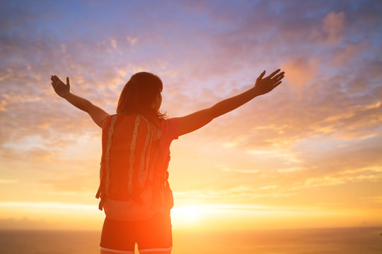 silhouette of woman feel free