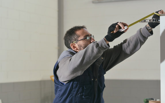 Carpenter working on a furniture piece