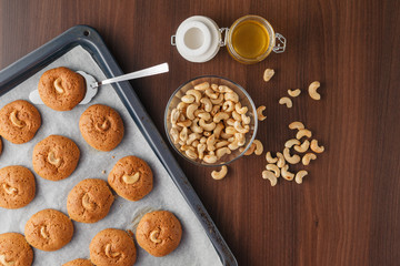 Ingredients for baking, milk, eggs, wheat flour, oats and kitche