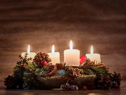 Advent  wreath with four burning candles  