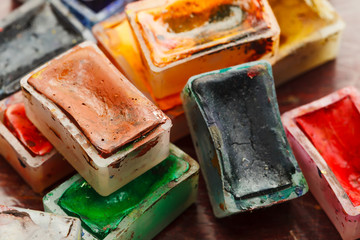 Old watercolor paints. Tools for creativity and crafts