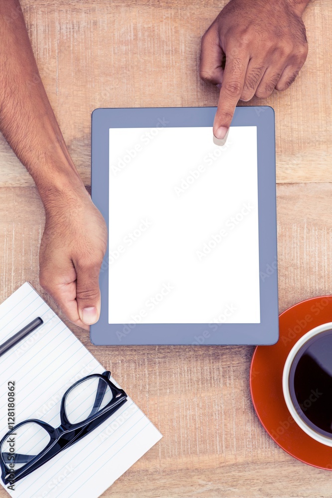 Poster cropped image of person using on digital tablet