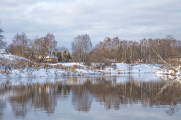 Fototapeta premium A beautiful winter scenery on the banks of river