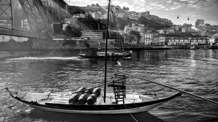 Old traditional boats with wine barrels, Porto, Portugal. (without  ads)