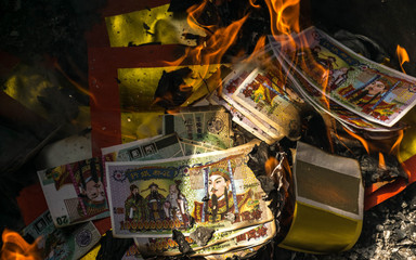Burn paper money, paper gold to the deceased. Which is the cultu
