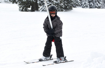 Fototapeta na wymiar Child boy on a ski tow