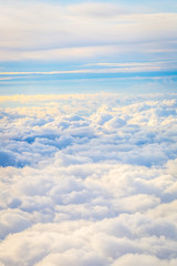 Fototapeta na wymiar Blue Sky Above the Clouds, Aerial View from Airplane