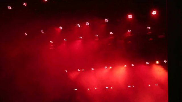 The red light at the concert. The light on the stage. Stage Light.