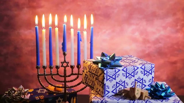 Jewish holiday Hanukkah Beautiful Chanukah decorations in blue and silver with gifts
