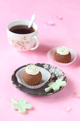 Kartoshka with poppy seeds - Traditional Russian Chocolate Sweet - on a pink background.