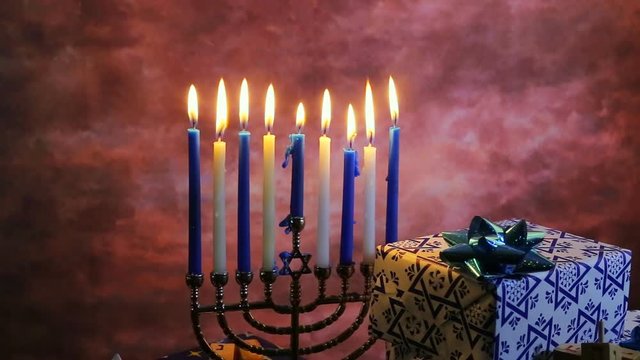 Jewish holiday Hanukkah Beautiful Chanukah decorations in blue and silver with gifts
