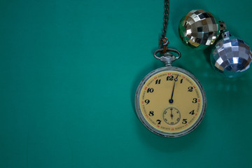 Christmas decorations on a green gradient background