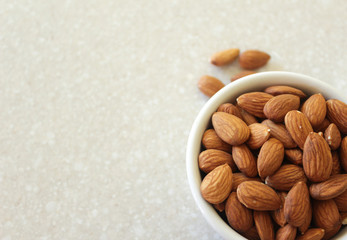 Almonds in Container on Kitchen Countertop, Positioned Off Botto