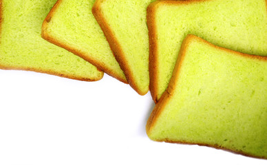 Pieces of pandan flavor breads, isolated on white background