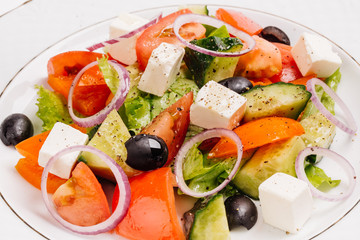 Salad with feta cheese and sun-dried olives