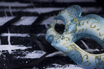 white blue glitter diamond masquerade mask party on black and white acrylic paint canvas