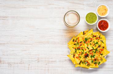 Nacho Tortilla Chips with Beer and Dip on Copy Space