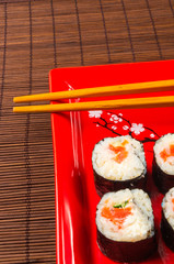 still life - set the rolls on a red plate