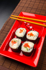 still life - set the rolls on a red plate