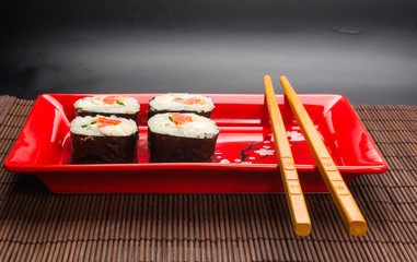 still life - set the rolls on a red plate