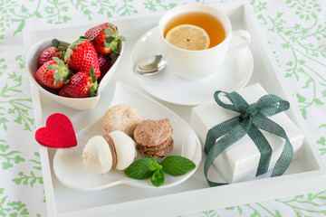 Romantic breakfast in bed and gift with love.