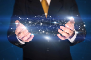Businessman holding network connections