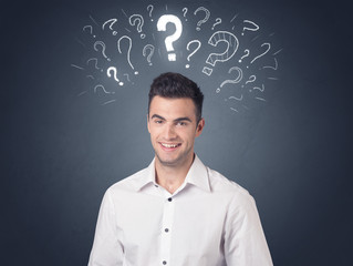 Businessman with question marks