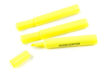 Three yellow highlighters isolated on white background