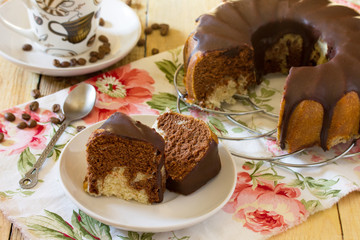 Traditional homemade cupcake with chocolate icing. Festive desse