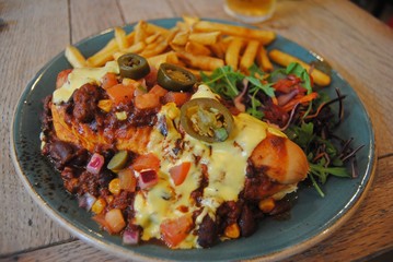 Plate of chili dog at a restaurant.