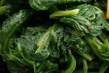 Chinese food. Spinach salad with vegetables