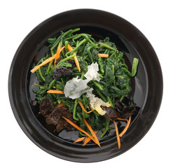 Chinese food. Spinach salad with vegetables