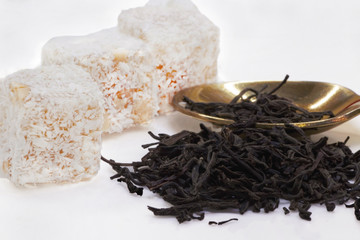 Turkish Delight and black tea isolated on white background