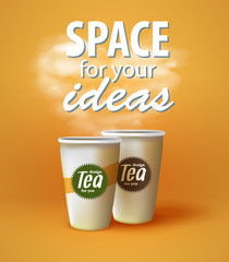 Two cups of hot black and green tea