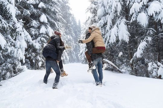 Friends Group Two Playful Couple Snow Forest Young People Outdoor Winter Pine Woods