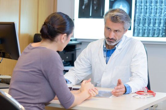 Doctor giving bad news to patient