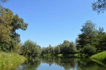 Fototapeta na wymiar Lake surrounded with the trees, Slovakia
