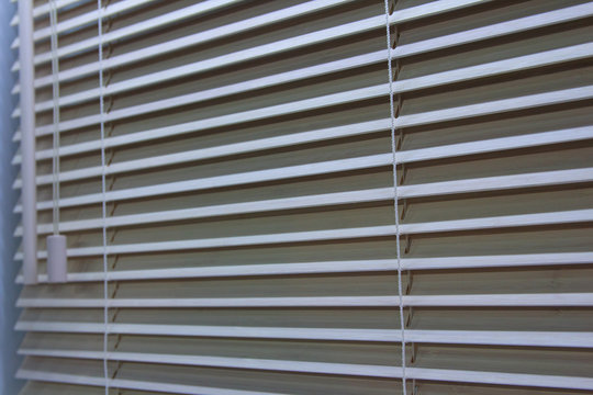 Wooden shutters on the window close-up. Interior